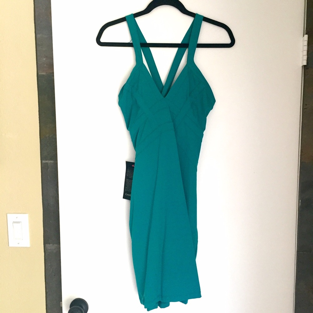 SALE 🎉 NWT 🐬 BEBE Sexy Teal Crossback Dress